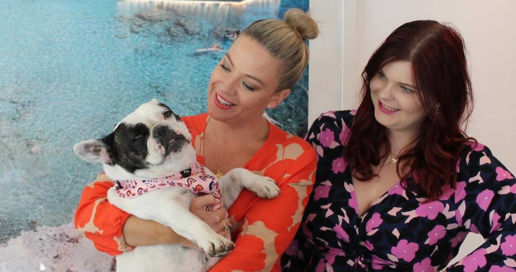 Amanda shares her New Year's resolutions for business success while smiling at her frenchie Ladybug